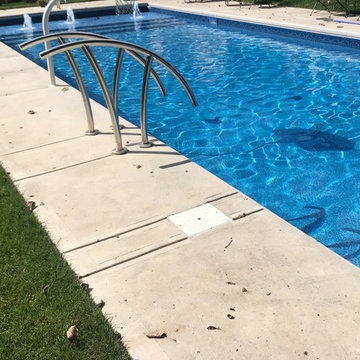Pool Remodel with Modern Water Features