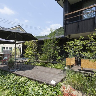 他の地域のラスティックスタイルのおしゃれなデッキ (日よけなし) の写真