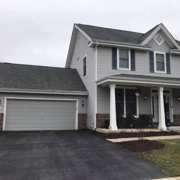 Second floor house addition and covered porch