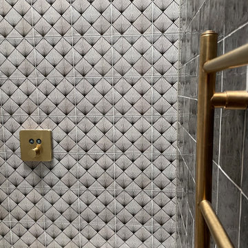 Two styles of tile in the ensuite bathroom
