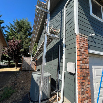 Siding Installation - James Hardie Lap in Iron Gray with Trims in Arctic White