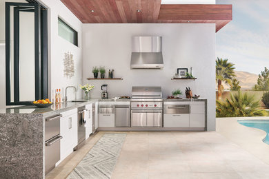 Inspiration for a mid-sized transitional patio remodel in Orange County