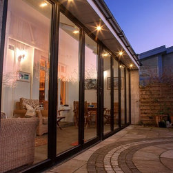 Fairco's bi-folding doors on a conservatory - Patio Doors & Bi-fold Doors