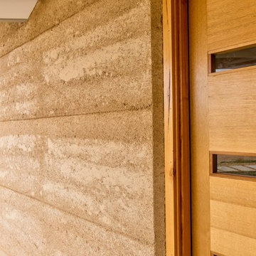 Rammed Earth & Radial Timber in Town