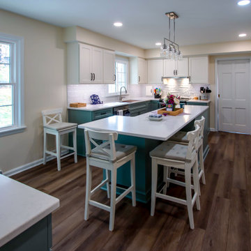 Custom Two-Toned Green and White Kitchen with Laventa Carrara Quartz Countertops