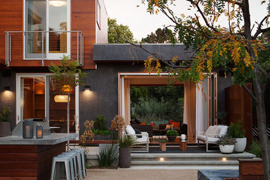 Photo of a large contemporary backyard patio in San Francisco with no cover and concrete slab.