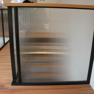 Glass and black metal railings