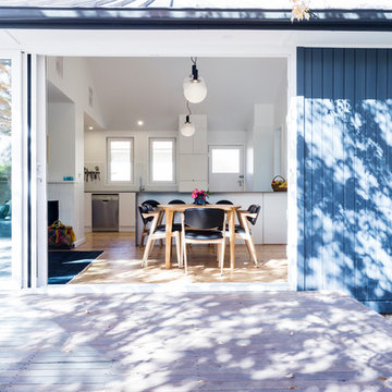 Sliding doors opening from the deck into the living and kitchen area