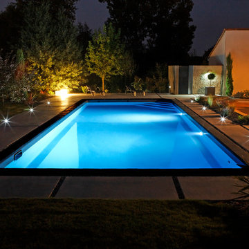 Plages de piscine en béton teinté