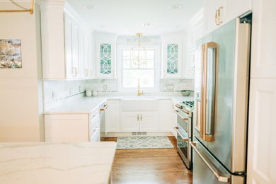 Example of a transitional kitchen design in New York