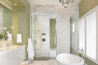 Bathroom - large contemporary master white tile and porcelain tile porcelain tile bathroom idea in Edmonton with flat-panel cabinets, white cabinets, a bidet, green walls, an undermount sink and marble countertops