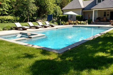 Inspiration for a large timeless pool remodel in New York