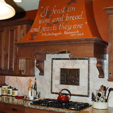 Rustic Cherry Kitchen with Wood Range Hood