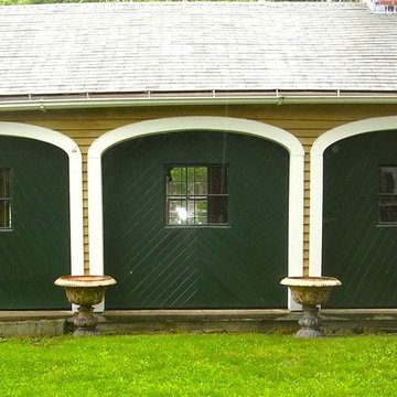 Arched screen doors for a barn ell