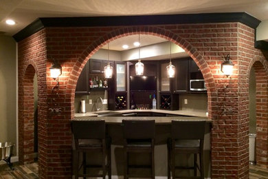 Home bar - mid-sized transitional home bar idea in Indianapolis