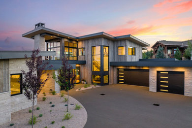 Large minimalist two-story wood exterior home photo in Salt Lake City