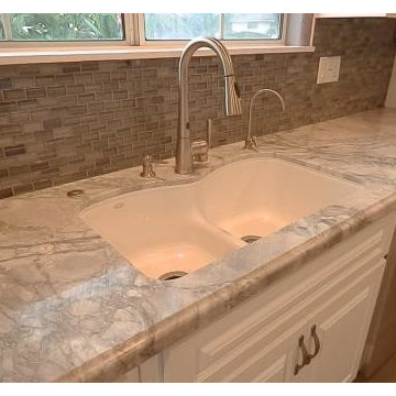 Kohler Langlade sink, under mount. Glass back splash