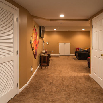 Finished basement with exercise area and small bath in Wexford, PA