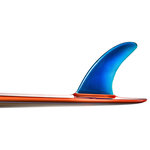 Timothy Hogan Studio - "Plastic Fantastic" Surf Art Photograph, Unframed, 14''x18'' - Plastic Fantastic Single Fin Surfboard Print by Timothy Hogan. Sunny, fun and bright would be used to describe this image. The orange rails and brilliant blue single fin on this vintage surfboard add a splash of color while the sleek outline completes a modern look. This bold orange and blue single fin was the personal surfboard of legendary surfer Jeff Hackman. Photographed by Timothy Hogan at the Surfing Heritage and Cultural Center in San Clemente, California.