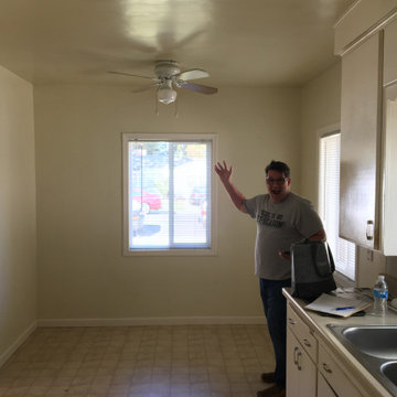 BEFORE PIC!! The window behind the Owner's left shoulder was removed