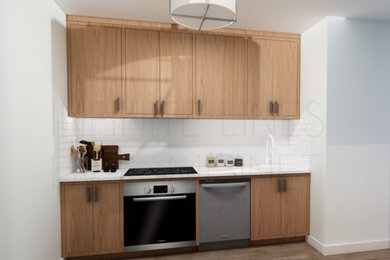 Kitchen - scandinavian kitchen idea in New York with flat-panel cabinets, light wood cabinets and no island
