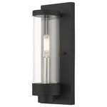 Livex Lighting - Textured Black Nautical, Moder, Industrial, Urban Outdoor Wall Lantern - The small single-light outdoor hand crafted wall lantern from the Hillcrest collection is made of rugged stainless-steel and features a simple yet elegant textured black finish frame paired with a closed top clear glass shade and is accented by a brushed nickel candle. The glass shade is topped off with a textured black ring accent to carry through the theme of the finely crafted design. Use indoors or outdoors, this piece complements modern, nautical, contemporary or urban homes.