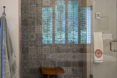 Inspiration for a large contemporary master gray tile, multicolored tile and cement tile corner shower remodel in Seattle with gray walls and a hinged shower door