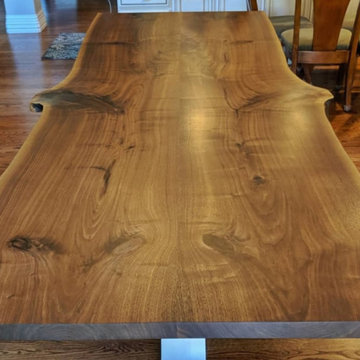 Book matched Walnut Slab Dining Table With Rolled Steel Base