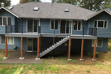 Deck - mid-sized transitional backyard deck idea in Seattle with no cover