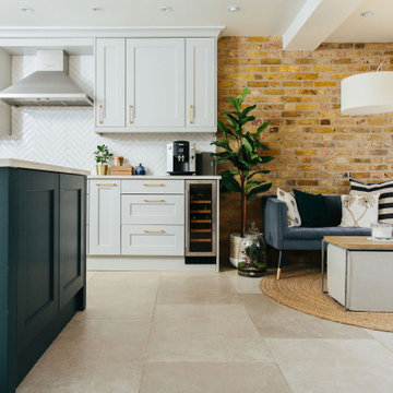 Classic open plan kitchen living space with brick feature wall