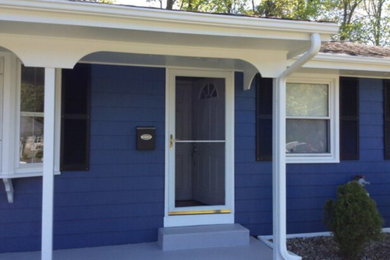 Inspiration for a mediterranean one-story wood exterior home remodel