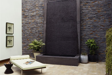 Patio fountain - contemporary patio fountain idea in Dallas