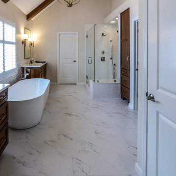 Luxury Spa Bathroom with Natural Warm Vanities, Quartz Countertop, Tiled Shower
