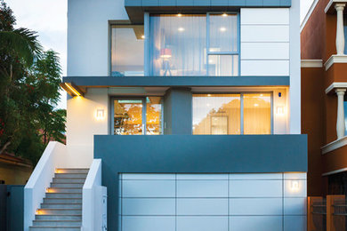 パースにある高級なコンテンポラリースタイルのおしゃれな家の外観 (コンクリートサイディング) の写真