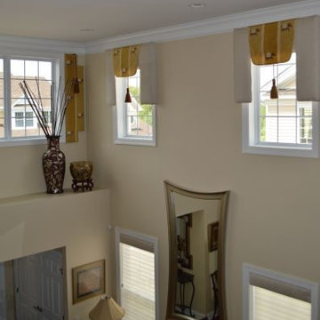 Two story Custom Treatments: Cornices, Shutters, Sheer Shades and Flags