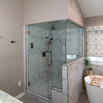 Traditional Master Bathroom With Warm Tones, Stand Alone Tub & Walk In Shower