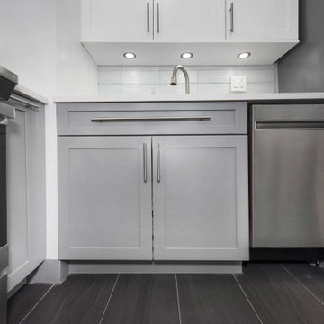 Grey Kitchen with Crystile Wave Backsplash
