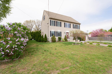 This is an example of a transitional home design in Providence.