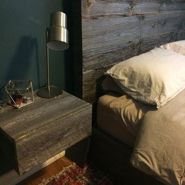 Low profile storage bed with floating nightstands