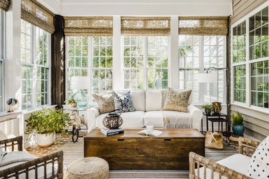Inspiration for a small timeless brick floor sunroom remodel in Charlotte