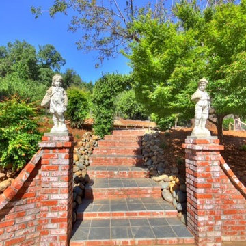 Brick Stairway to the vegetable garden and horseshoe pit