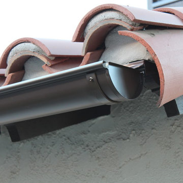 Half Round Rain Gutters with Wrap Around 10 Gauge Twisted Rafter Mount Brackets