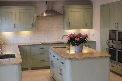 Inspiration for a classic kitchen/diner in Hampshire with an island.