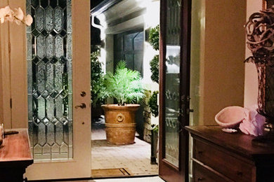 Example of a trendy entryway design in Other