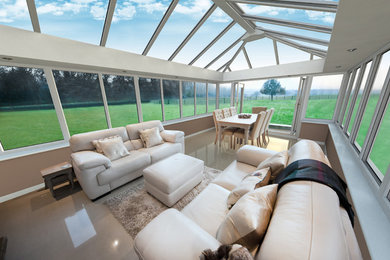 Photo of a contemporary sunroom in Essex.