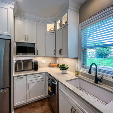 White Kitchen with Black Range Hood and Taj Royale quartz Countertops