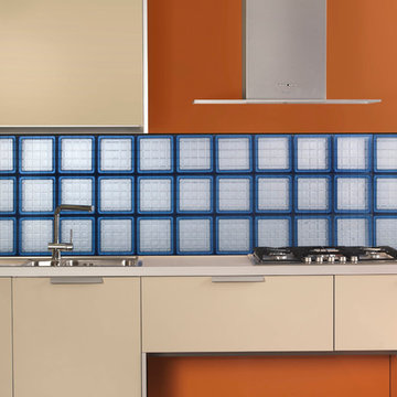 Mosaic glass block tile backsplash in a modern kitchen