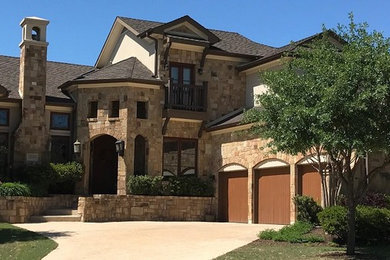 Inspiration for a mediterranean exterior home remodel in Dallas