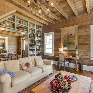 Family room - country enclosed medium tone wood floor family room idea in Nashville with brown walls