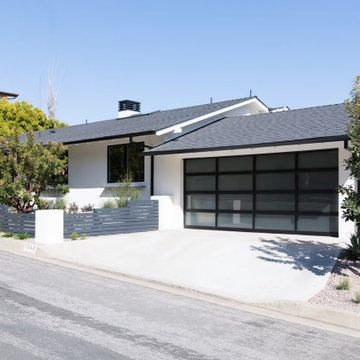Streamlined exterior with bold garage